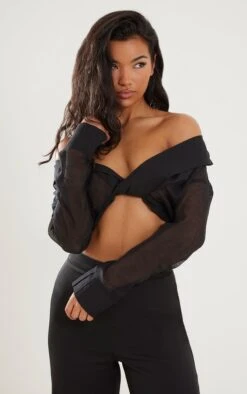 Blouse Texturée Transparente Noire à Col Bardot